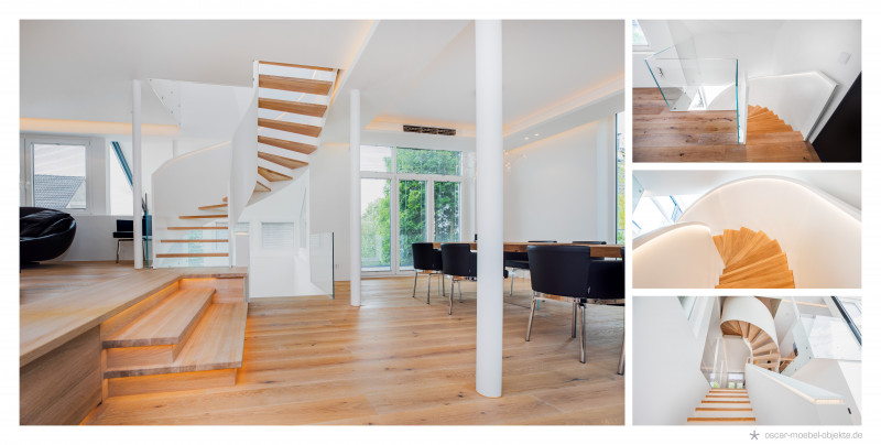 Eine präzise gefertigte Wendeltreppe aus hellem Holz, die sich elegant in den Wohnraum mit Parkettboden einfügt.